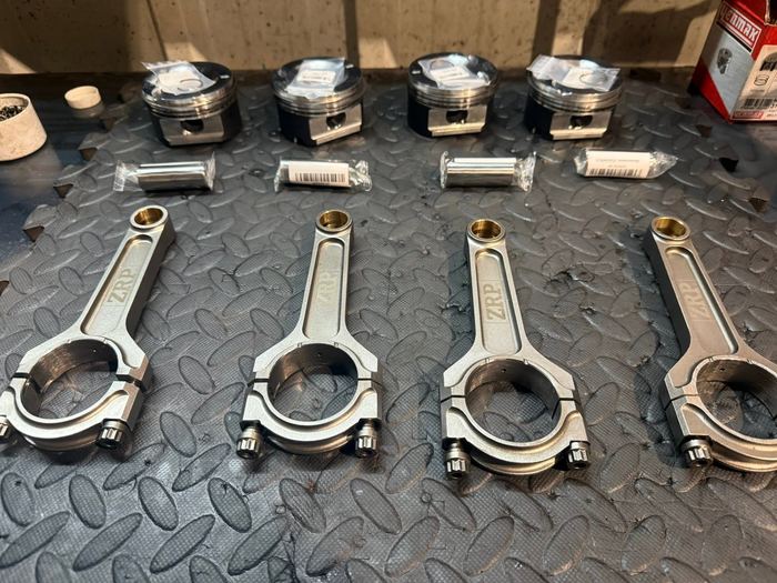 Rods and pistons ready to fit